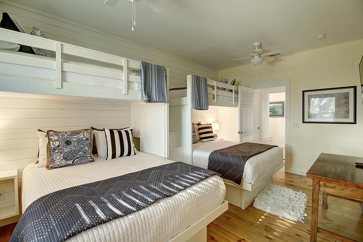 Your twin bunk beds offer cozy comfort with custom built-ins and plenty of storage space for a perfect shared getaway.