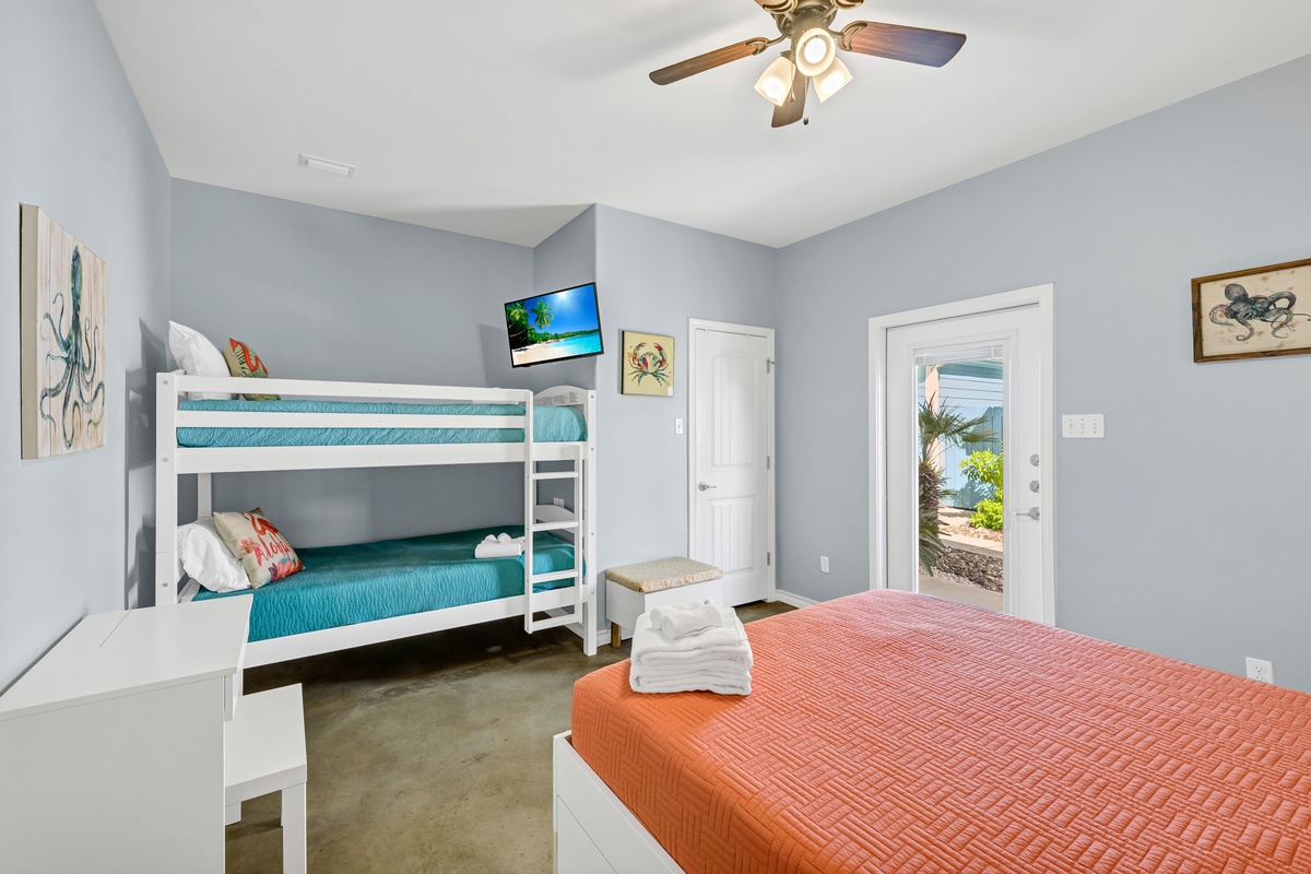 Your family bedroom offers flexible sleeping with bunk beds and a private bed, plus your own TV for relaxation.