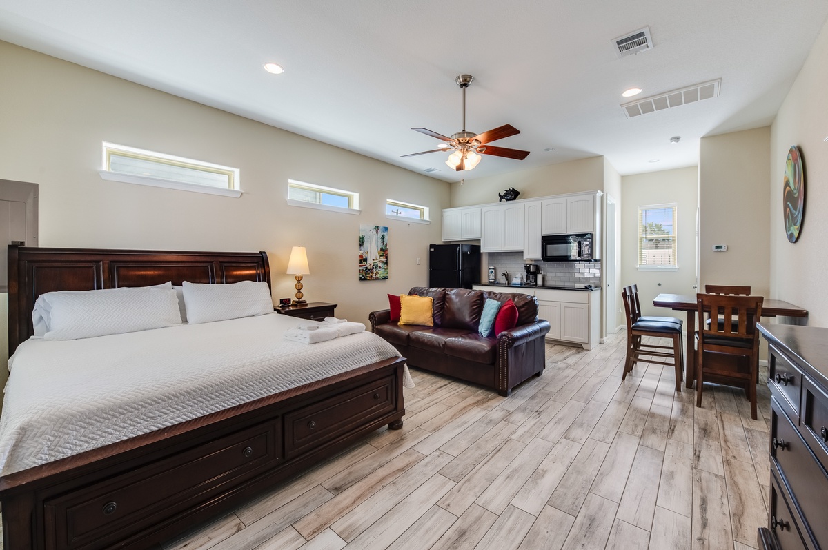 Your stylish studio combines comfort and convenience with a plush bed, cozy seating, and fully equipped kitchen—perfect for extended stays.