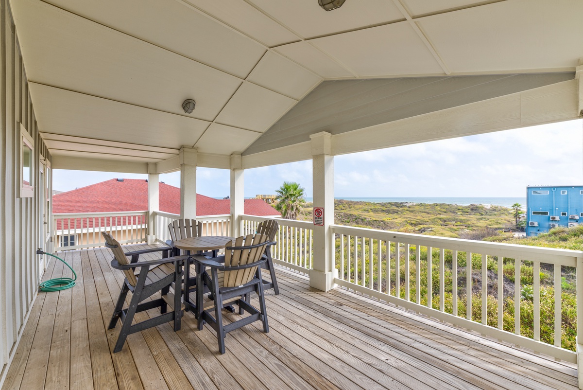 Relax on your private covered deck with coastal views, where morning coffee and evening meals become memorable moments.