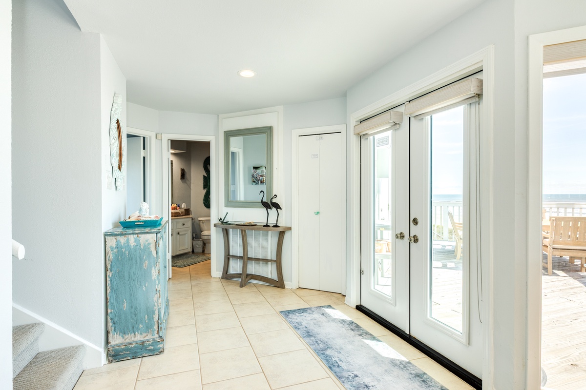 Step into the bright coastal entryway of Butterfly Dunes