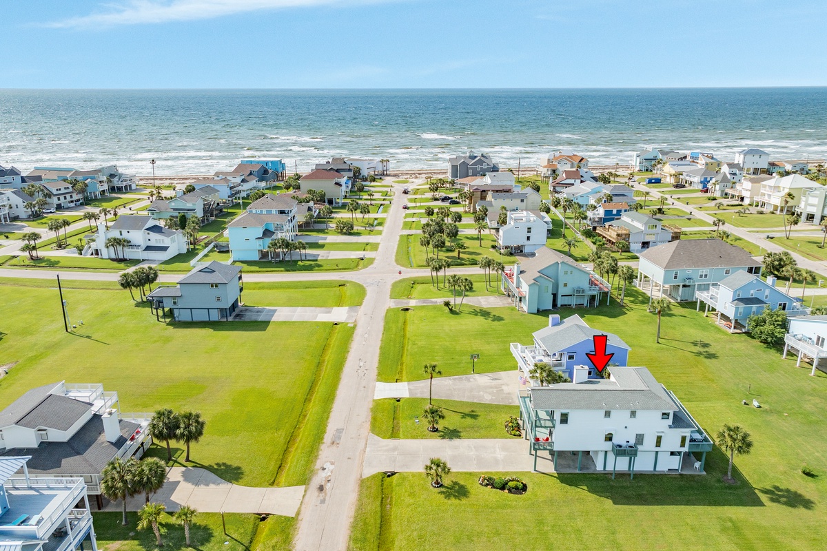 You'll be just 10 houses away from the surf and sand