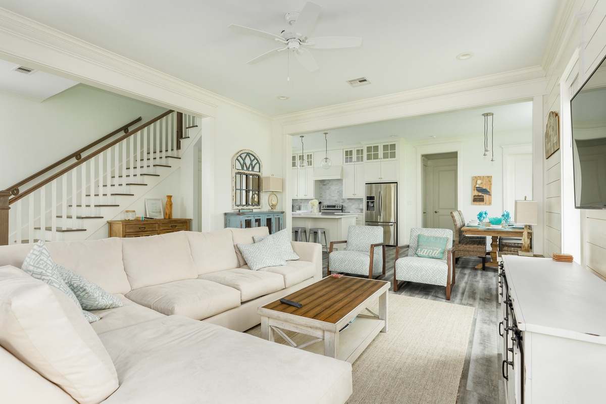 Open living area with cool coastal color palette