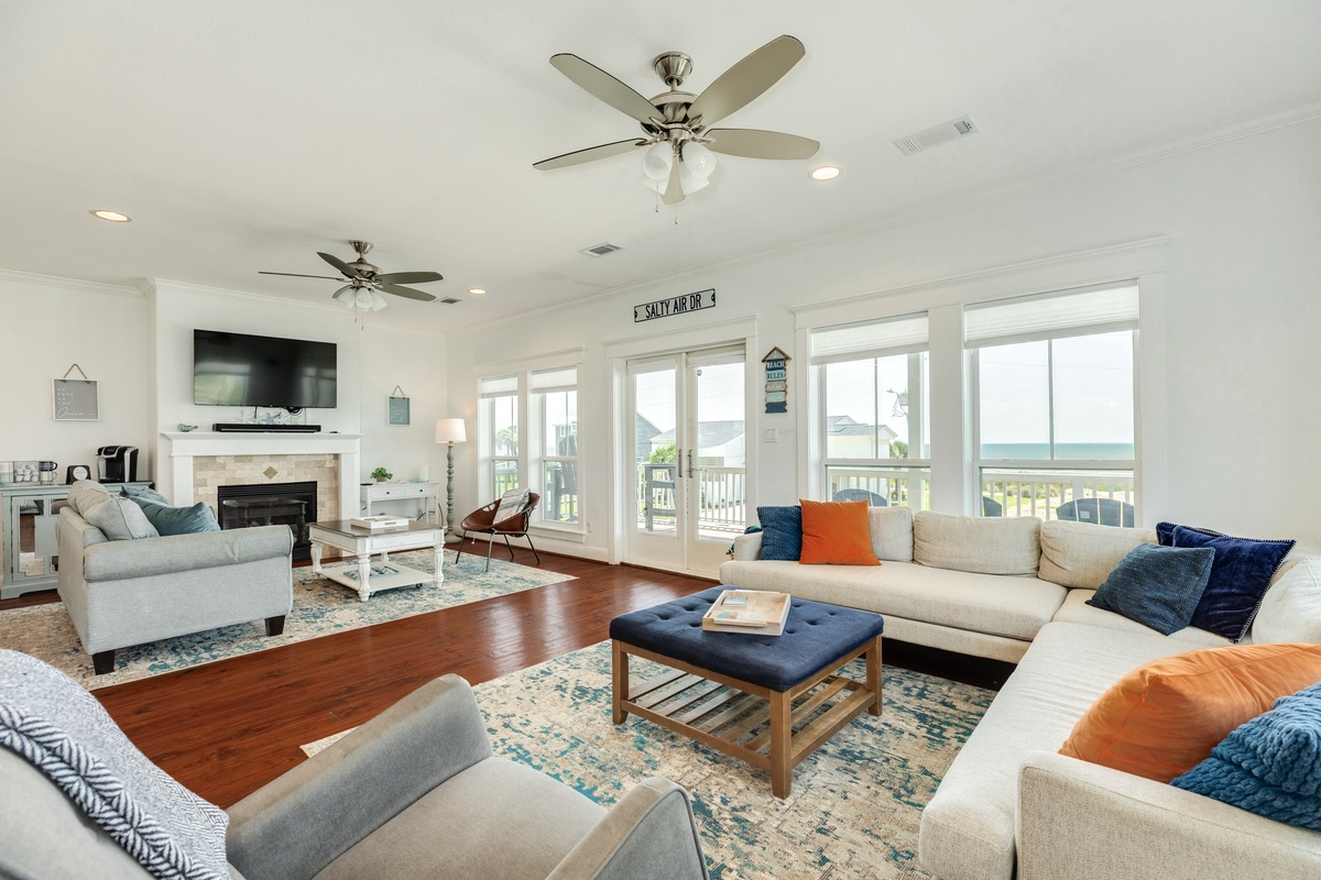 Spacious living area with multiple seating spots