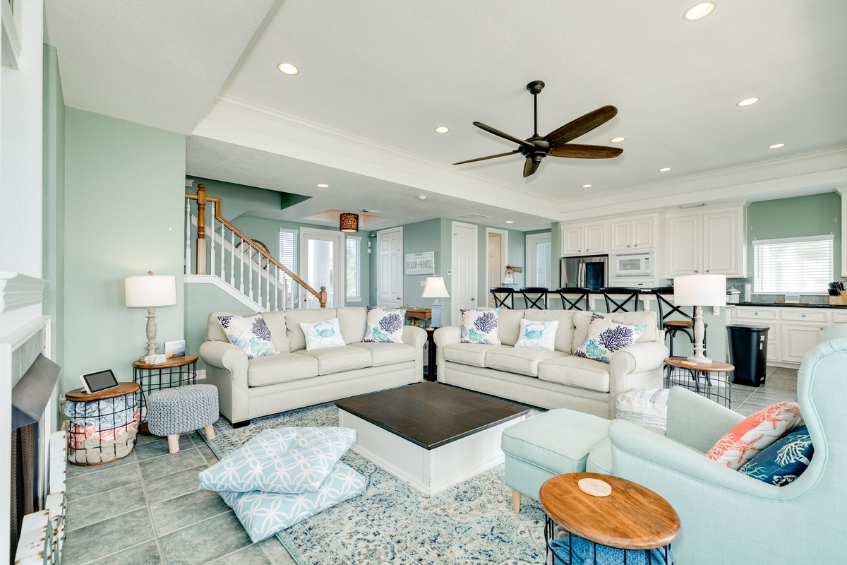 Bright and airy living area with cool coastal color palette