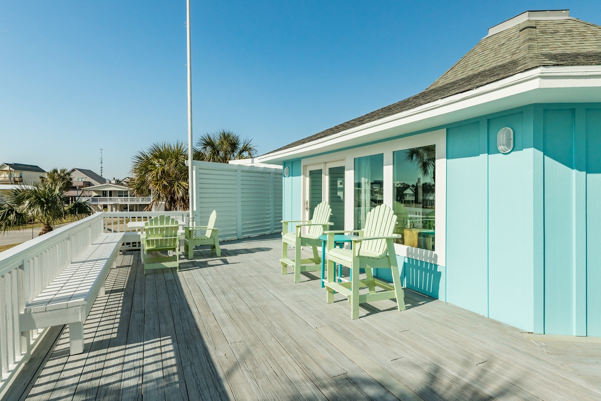 Abundant seating on the large wraparound deck