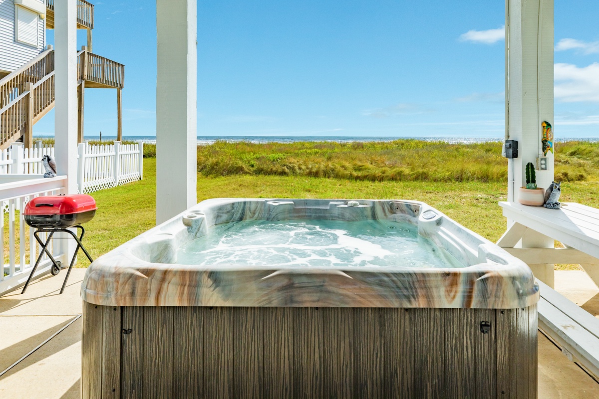 Hang out in the beachfront hot tub