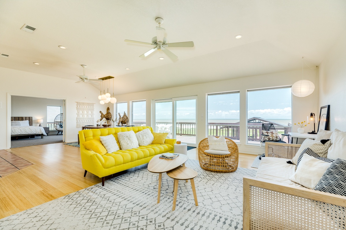 Bright and airy living area with wall of windows