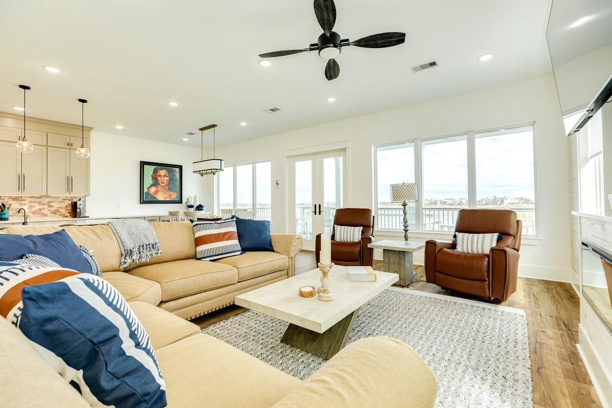 Bright and airy living area with wall of windows