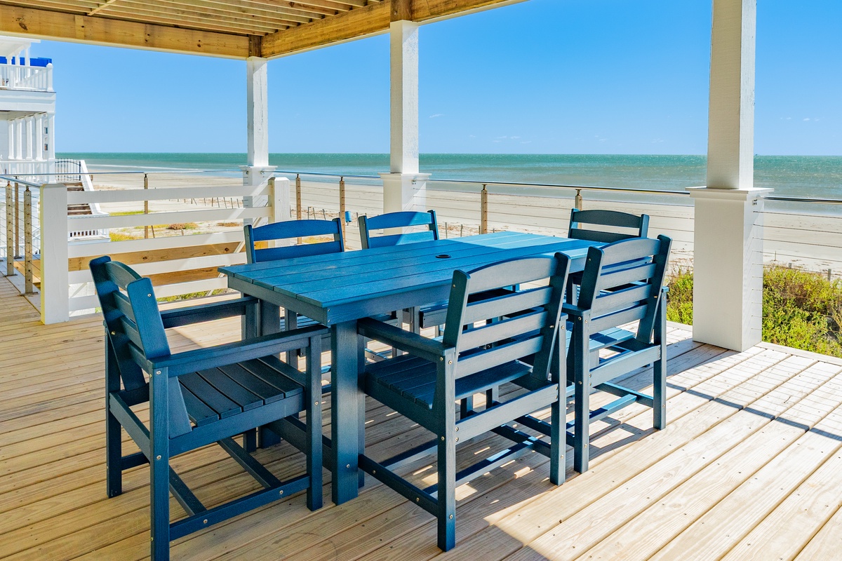 Dine al fresco and watch the waves in the distance