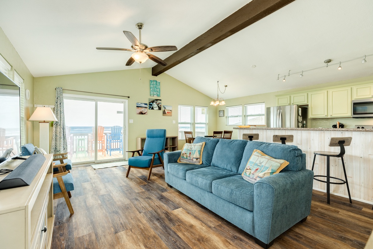 Bright and airy living room showcasing beachfront views