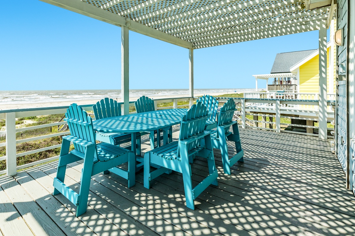 Dine al fresco and watch dolphins swim in the Gulf
