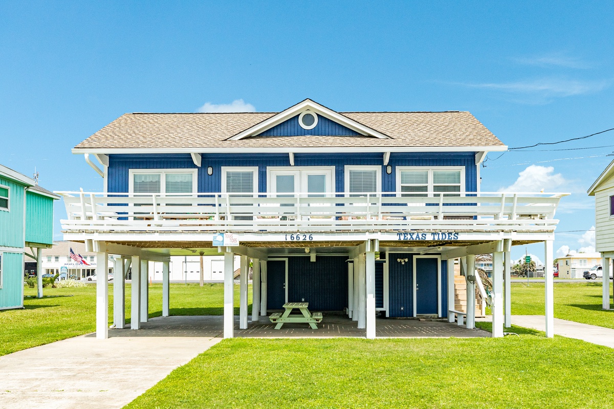 Bring the whole family, pups included, to this beachside home