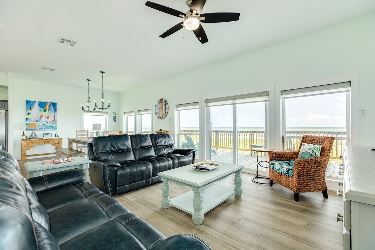 Bright & airy open living area with wall of windows