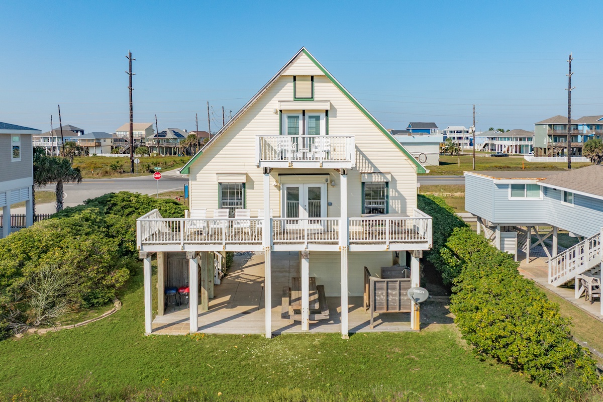 Enjoy beachfront views from 2 decks or the patio