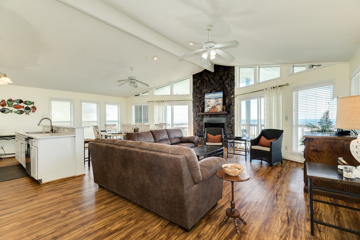 Large open living area with walls of windows