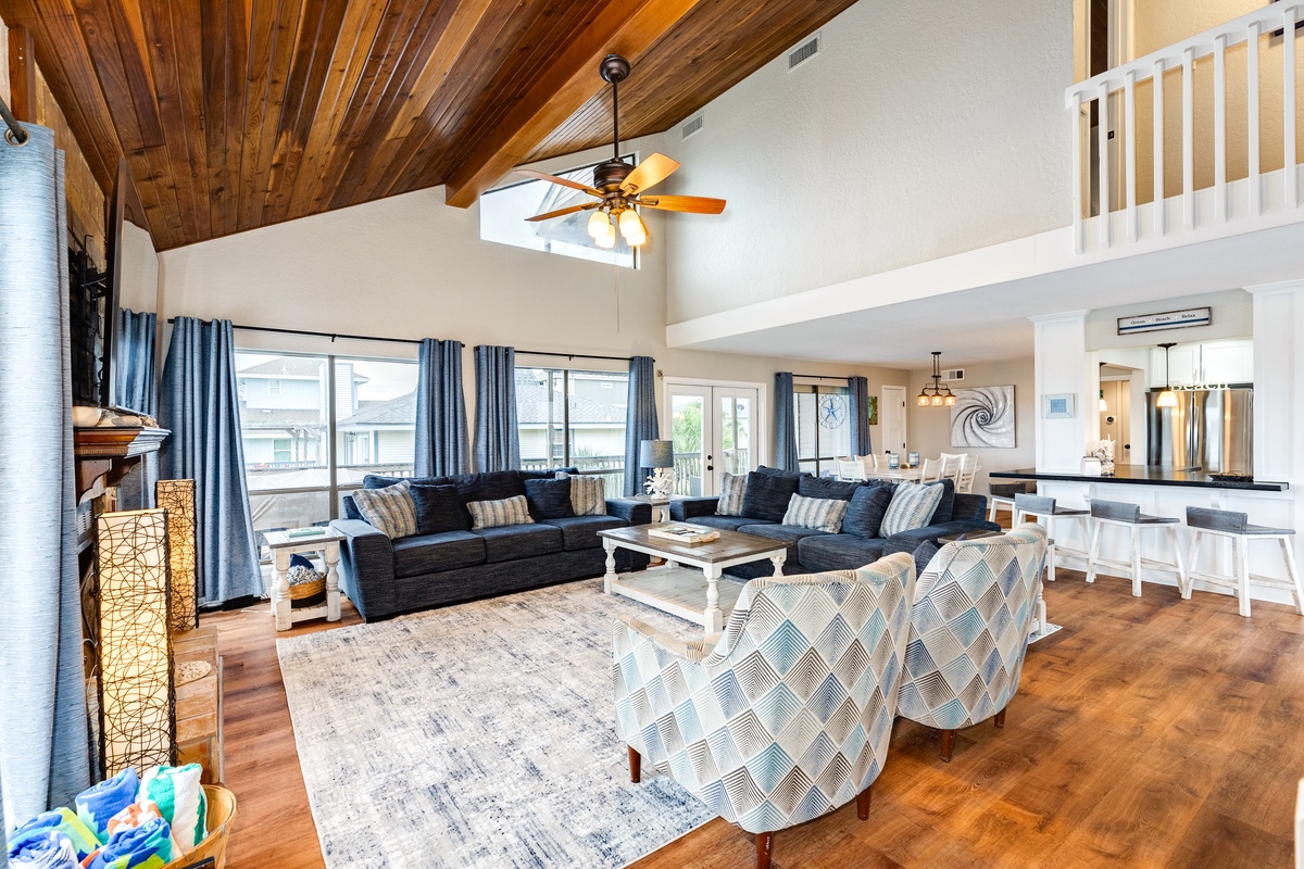 Open living area with vaulted ceiling