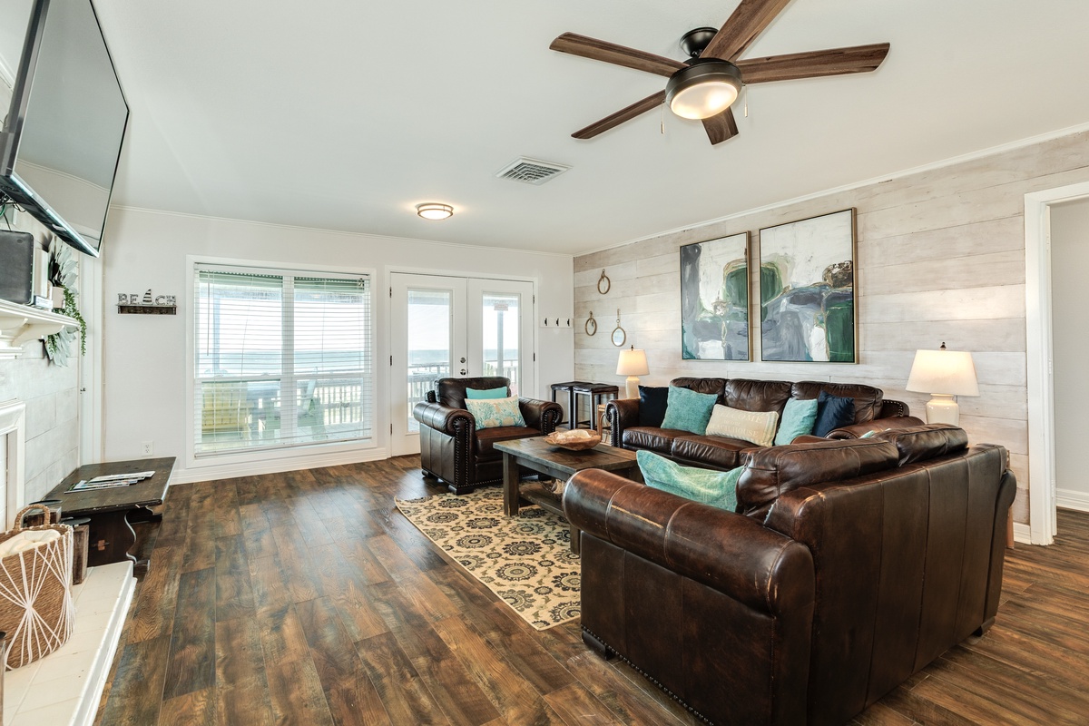 Comfortable living area with wall of windows