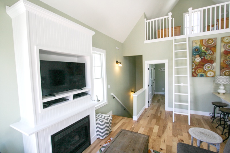 Living room with gas fireplace and flat screen TV