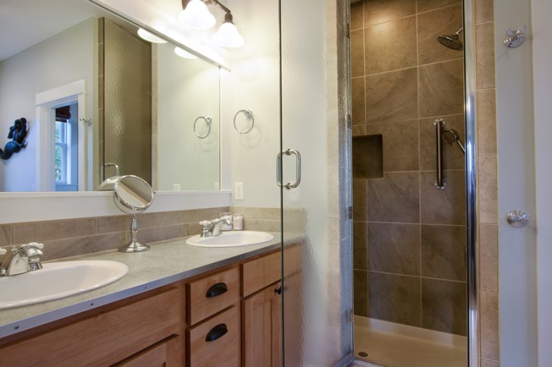 Main floor - heated and jetted soaking tub, a large walk-in shower