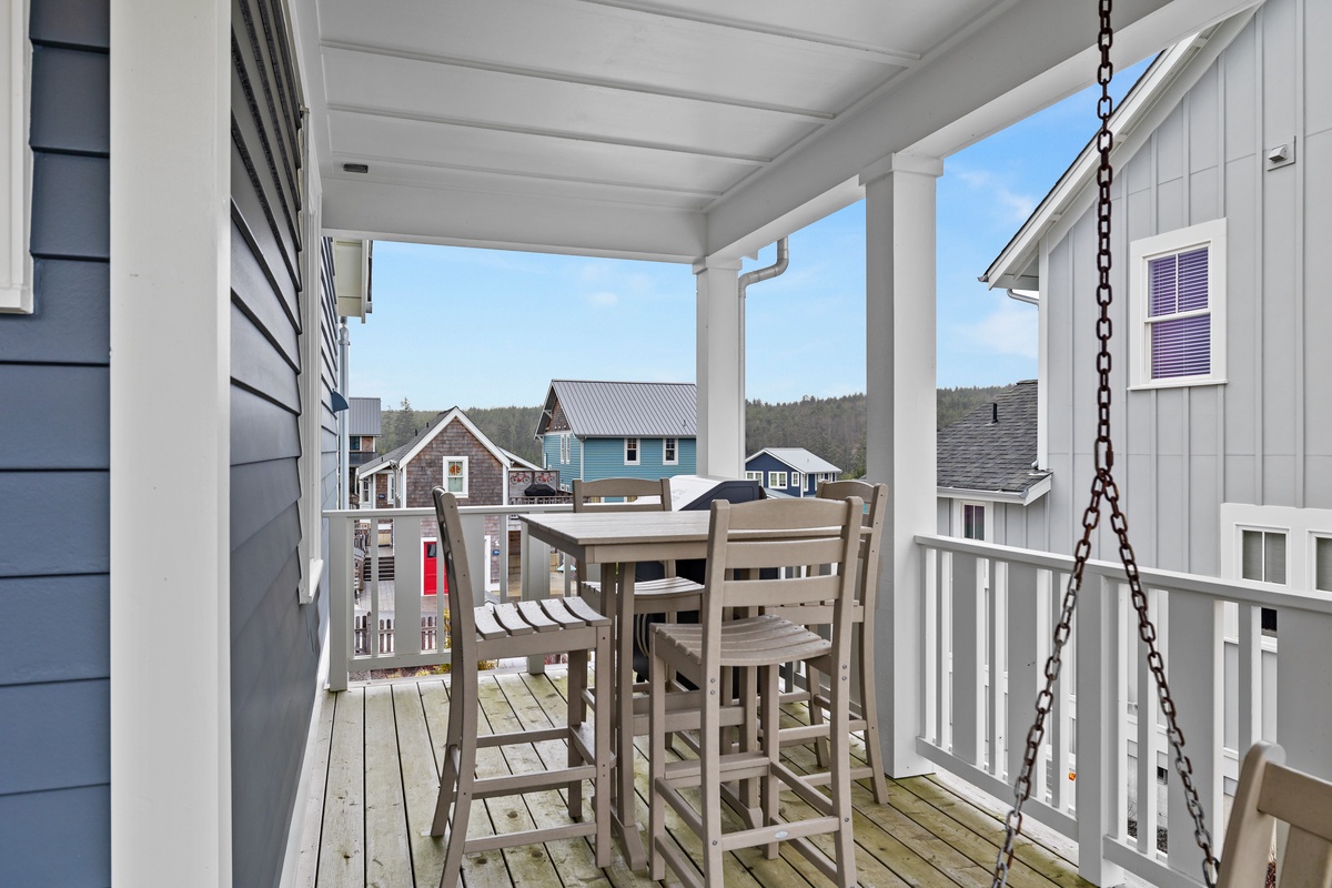 Front porch with swing and dining