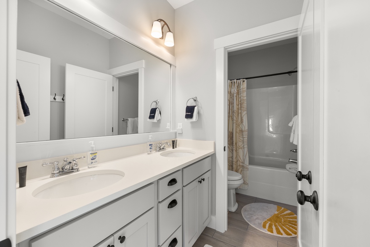 The shared bathroom is designed for comfort and ease during your stay