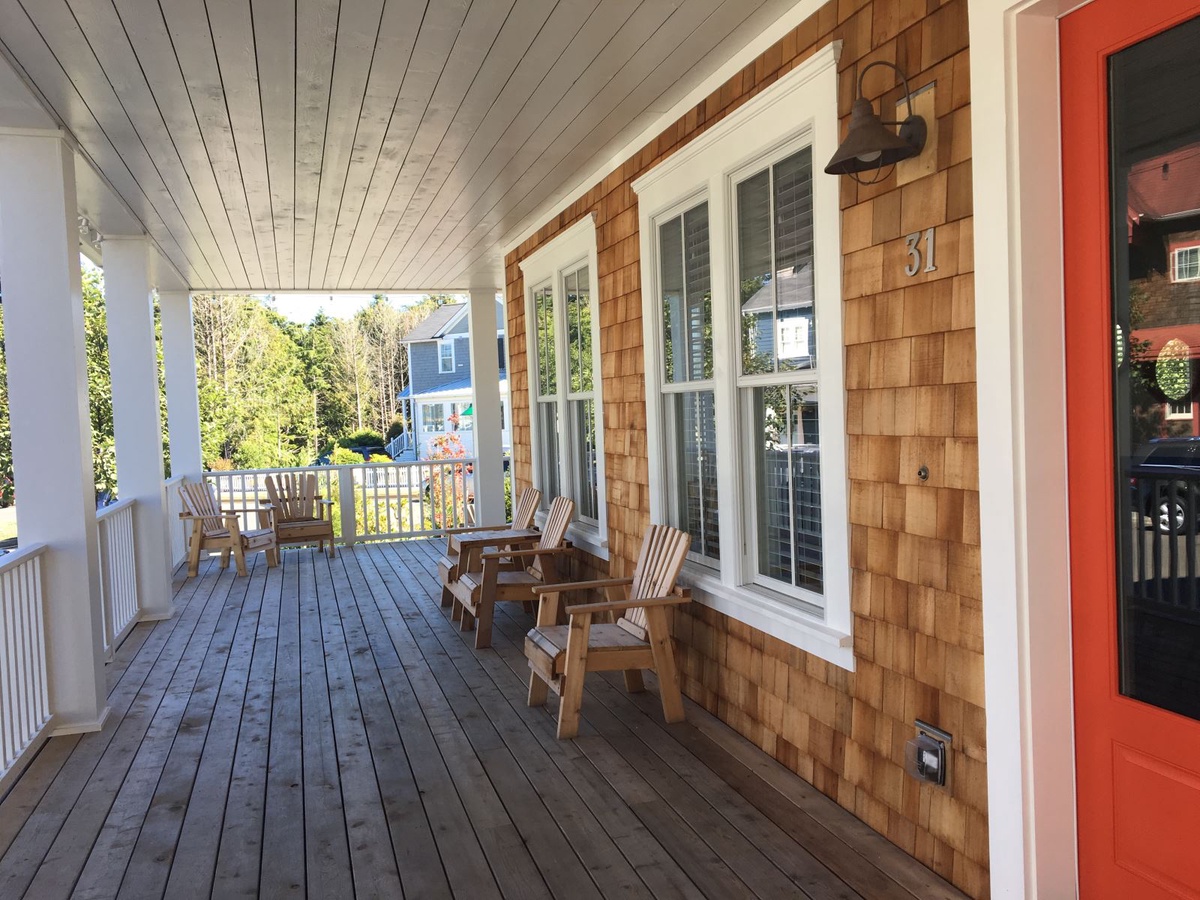 Covered wrap-around porch with outdoor seating