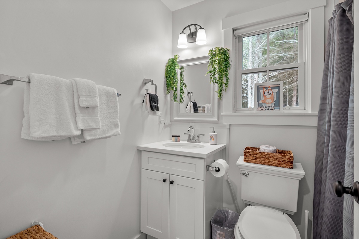 Full bathroom located across from the bunks