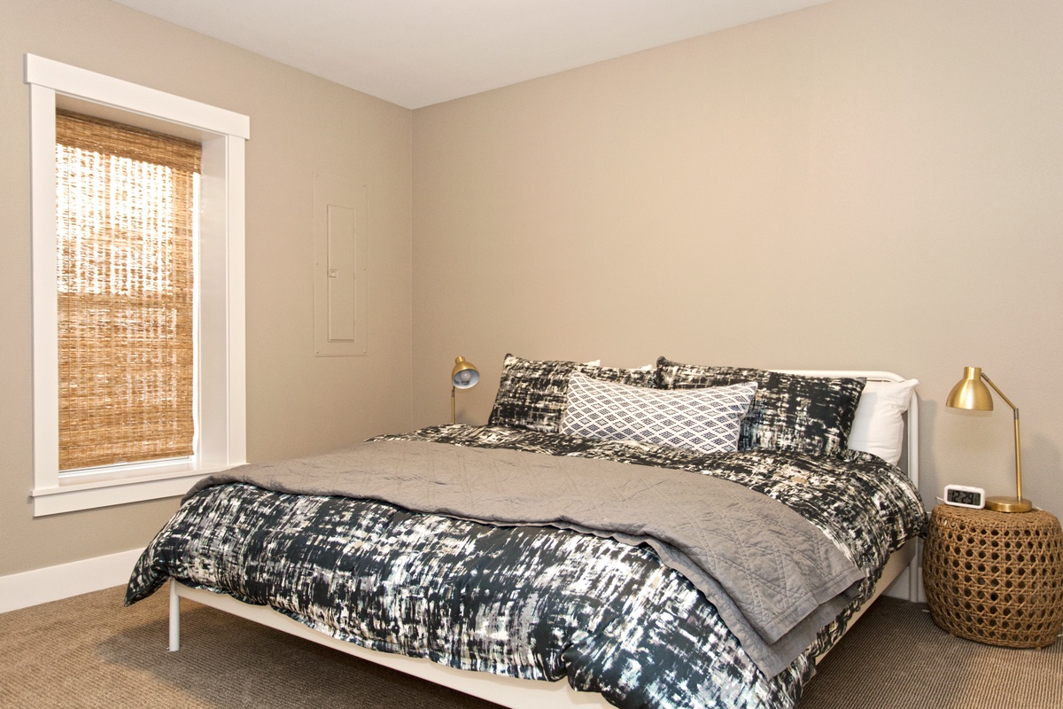 lower level king master bedroom with private bathroom
