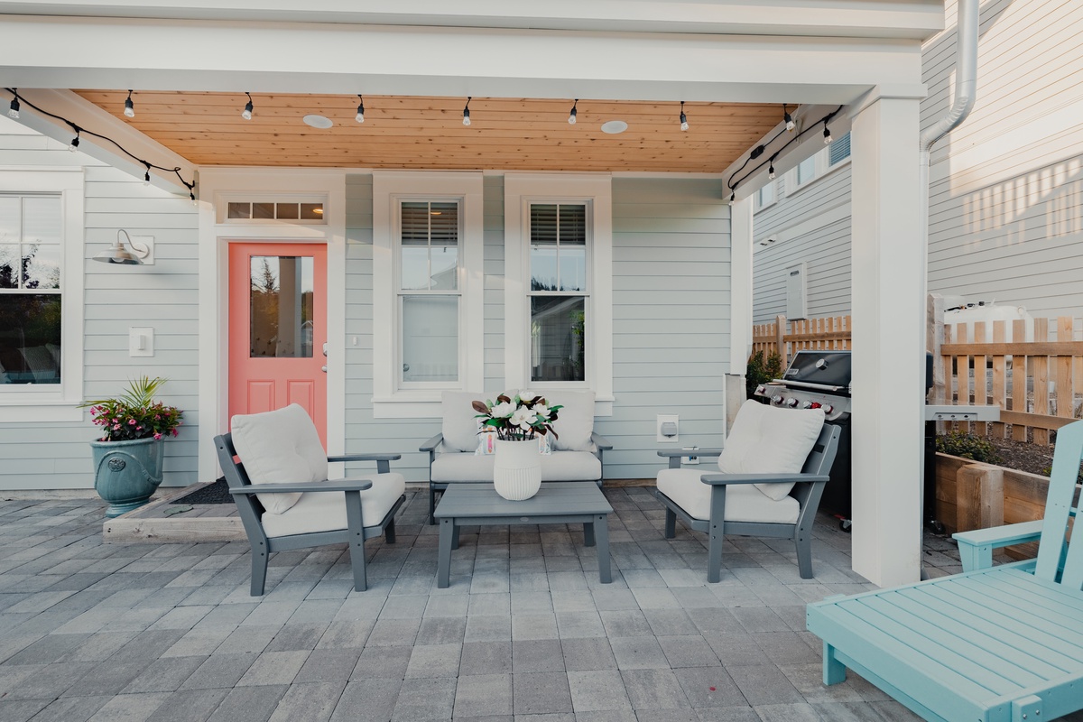 Fully-fenced backyard with seating