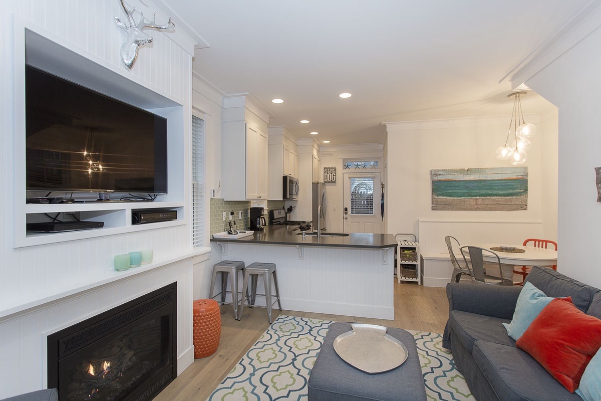 View of kitchen and dining from living room