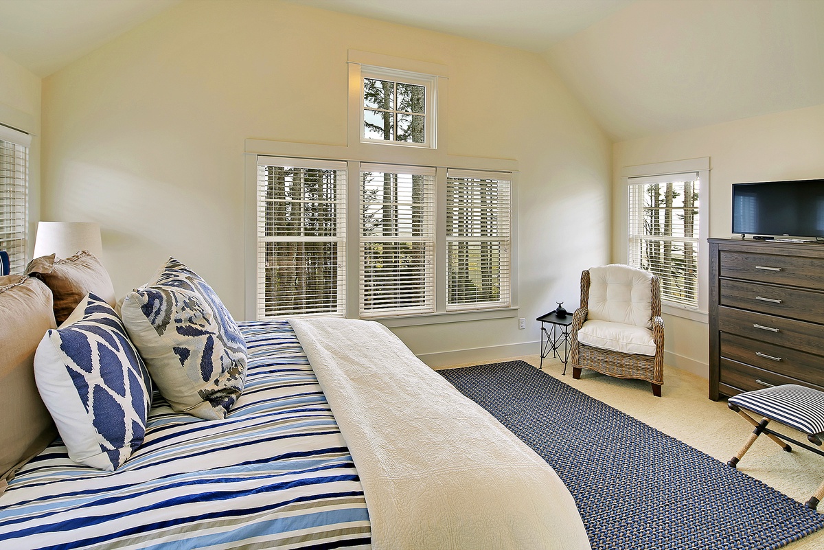 King primary bedroom with ocean views