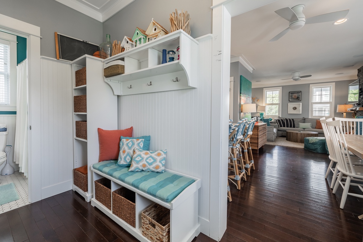 A comfy bench and plenty of storage in the mudroom