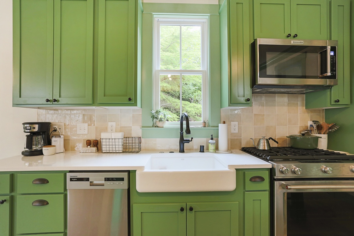 admire the trees from the large farm-style sink