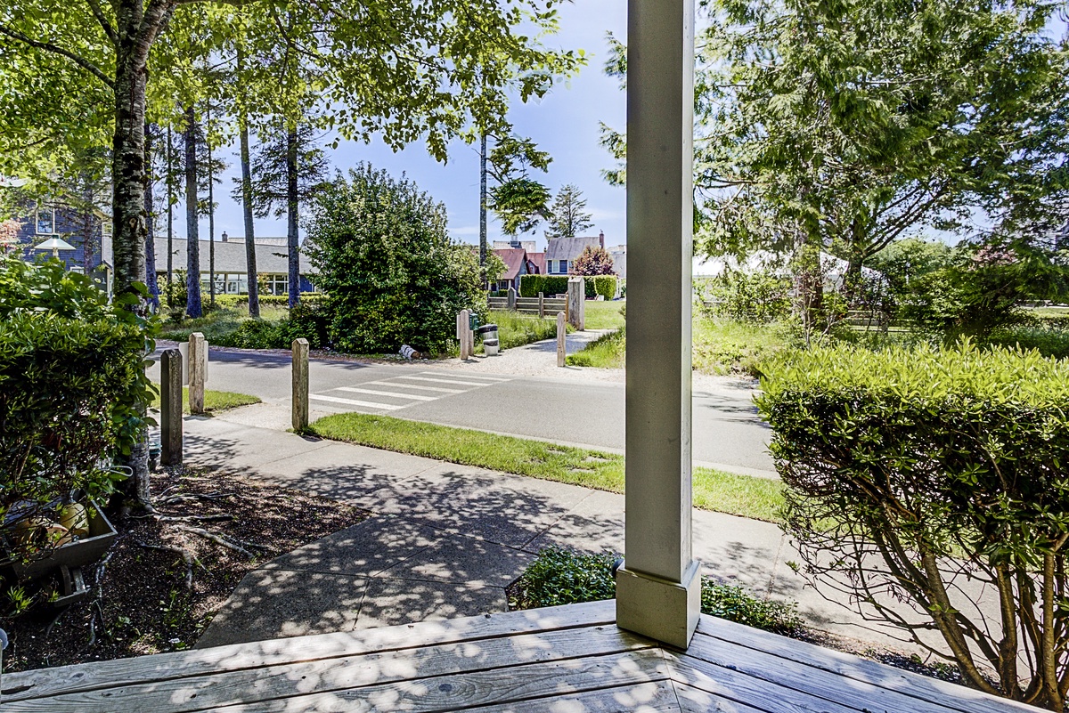 Covered front porch with view of Crescent Park