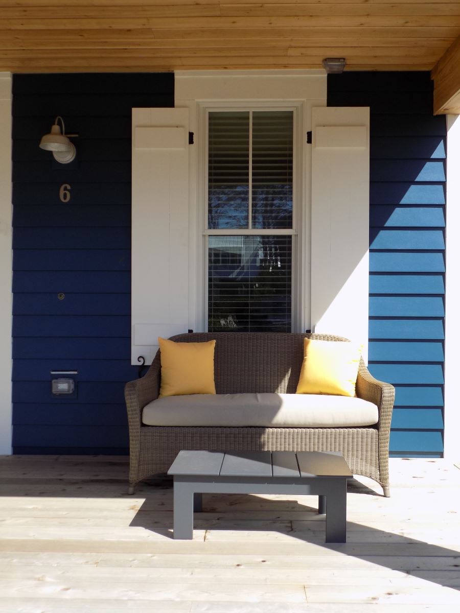 Cool off from the sun on the covered front porch
