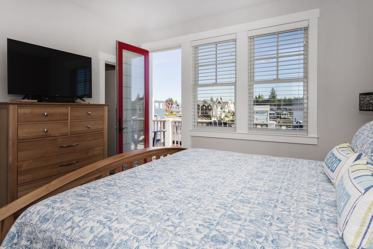 Second floor primary bedroom with balcony