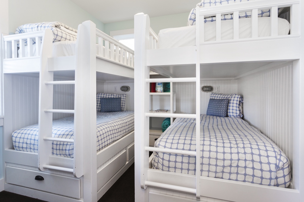 Main floor bunk bedroom with tv