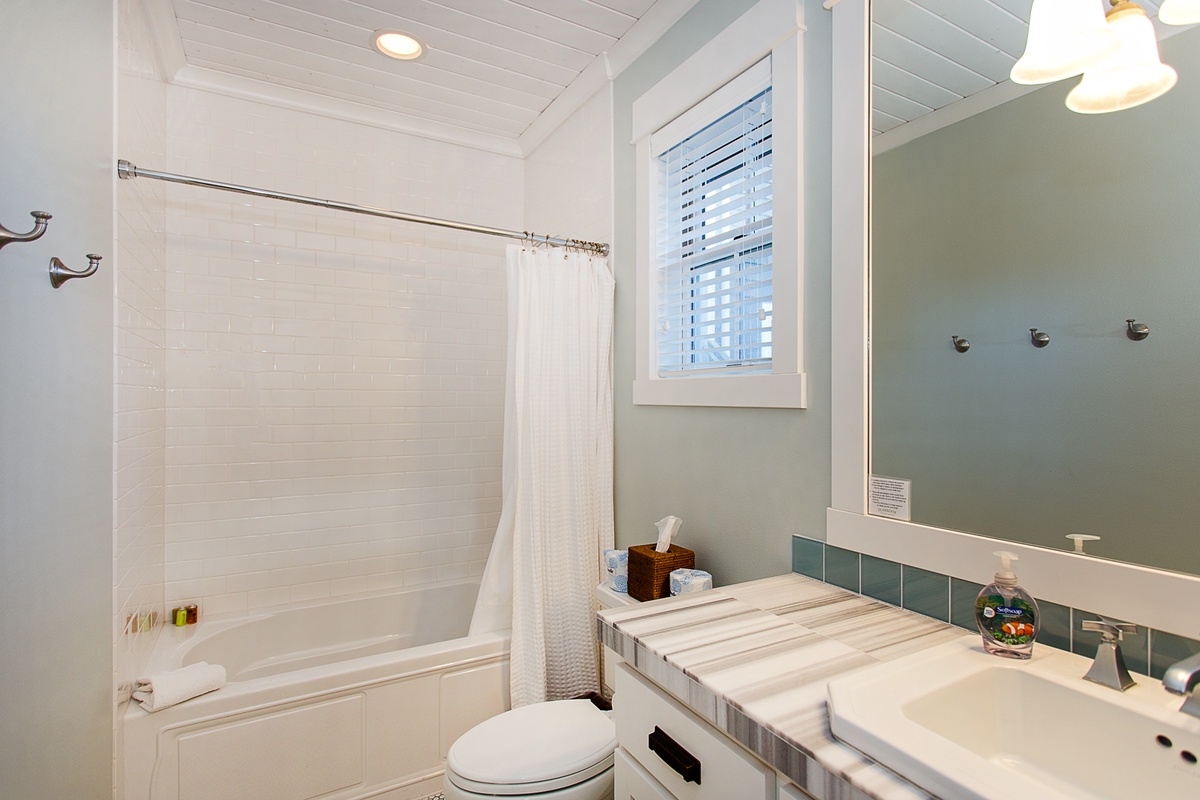 Full bathroom with shower and tub combination