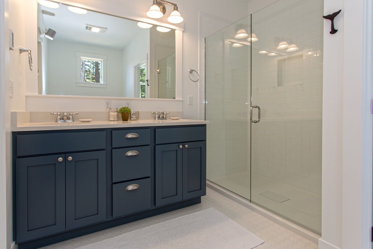 main floor master bathroom with soaking tub and shower