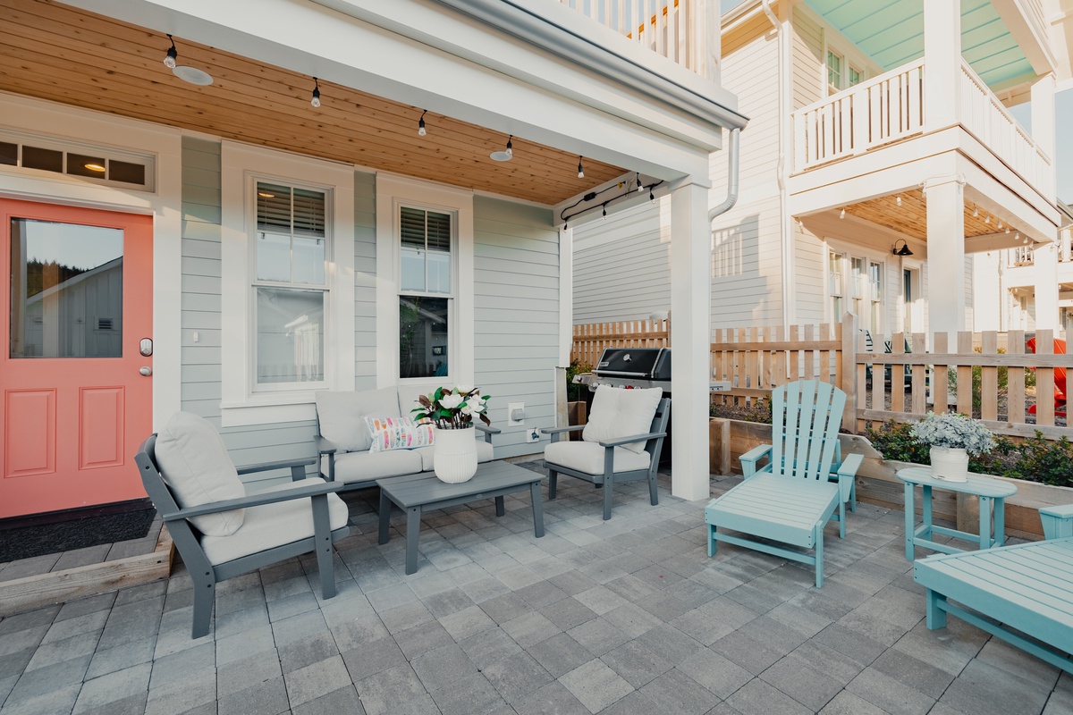 Fully-fenced backyard with seating