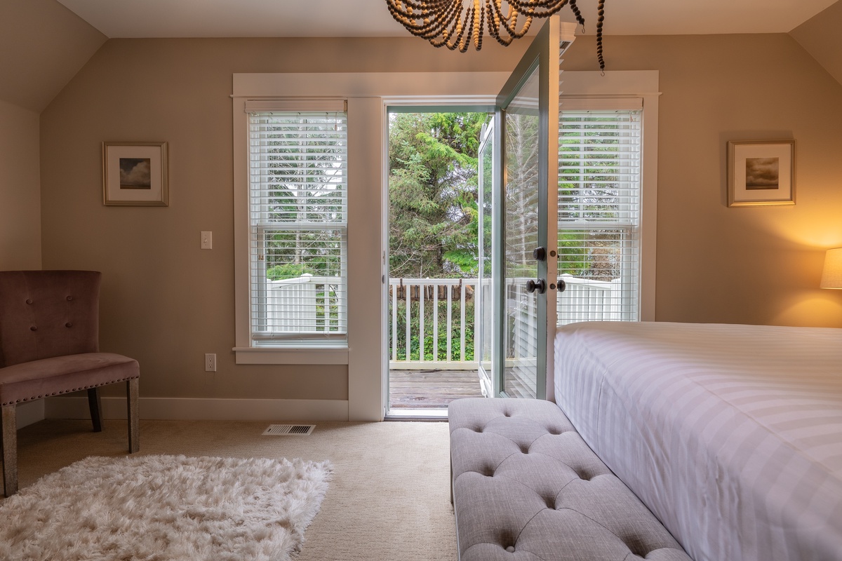 Primary bedroom with private balcony