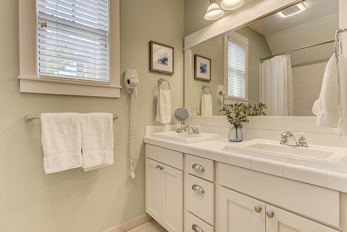 Primary ensuite Bathroom with dual vanities and plenty of space