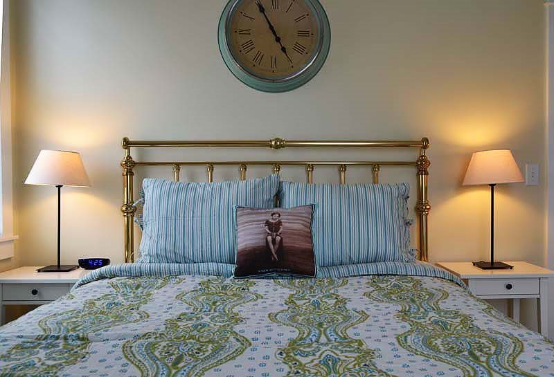 This guest bedroom is designed for restful nights and relaxing mornings