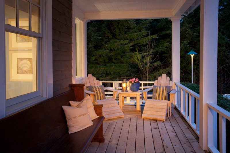 Large covered front porch facing South Alder Park, cedar Adirondack table and chairs