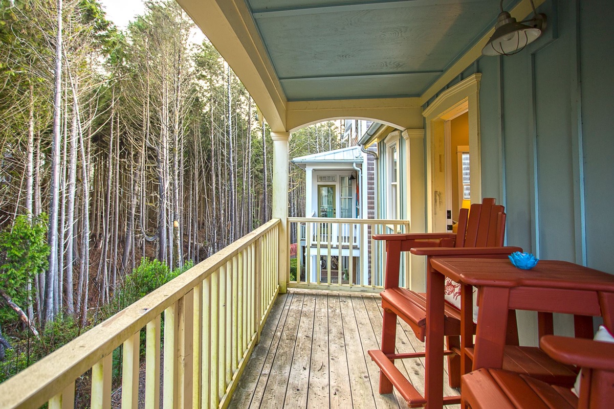 Balcony with seating and forest view