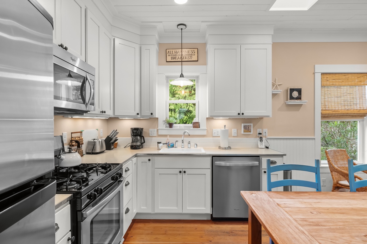 The kitchen is equipped with a gas range