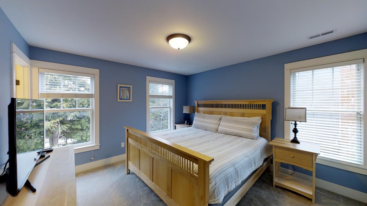 The primary king bedroom is perfect for a restful stay