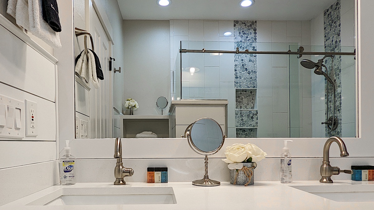 The ensuite bath features a walk-in shower