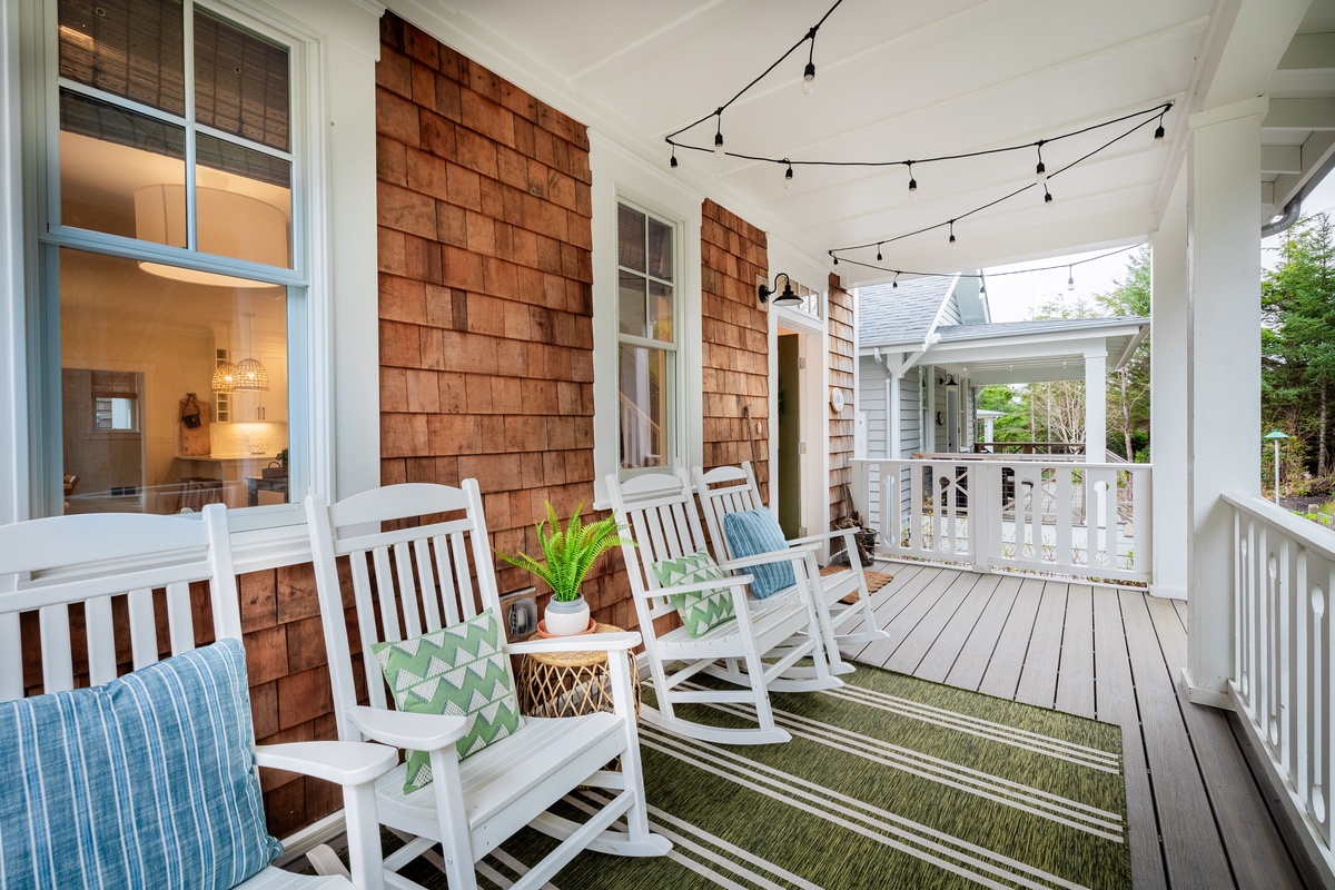 Covered front porch with rocking chairs